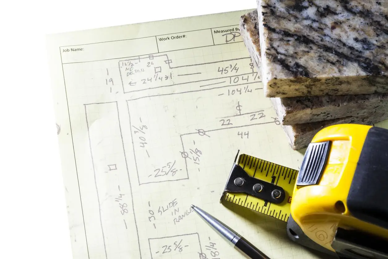 Commercial kitchen building plans with tape measure